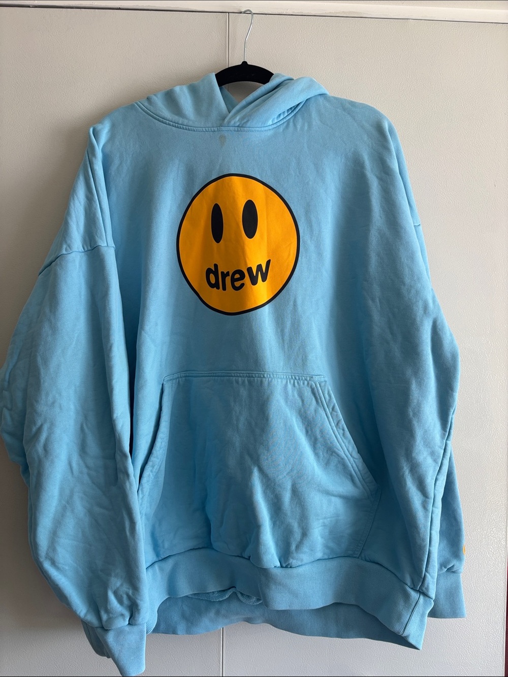 DREW Light Blue Hoodie with Yellow Smiley Logo